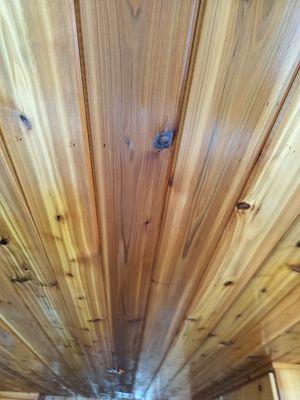 Installation of knotty cedar tongue and groove ceiling