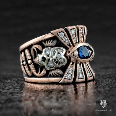 Jawbone Collection Eye of Providence Ring in 14K Rose and White Gold with Diamonds and Blue Sapphire by Nightrider Jewelry