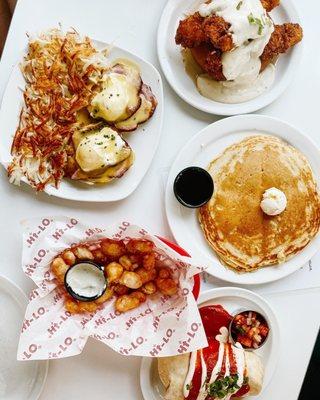 Spread of Breakfast Foods - Gary Cooper, Eggs Benedict, Pancakes, Burrito, and Spicy Cheese Curds