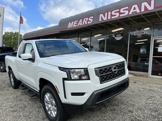 Nissan Frontier in front of Mears Nissan.