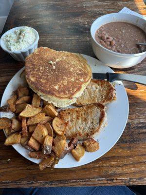 Pork loins, grilled. Fried potatoes, soup beans, cornbread, and slaw.