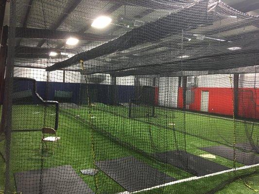 Back area. 4 baseball/softball cages with pitching mounds. 1 baseball/softball cage.