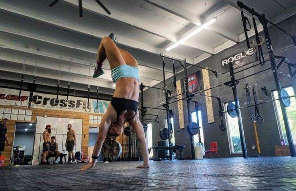 CrossFit Games Teen champion Kaela working on her Hand stand walks