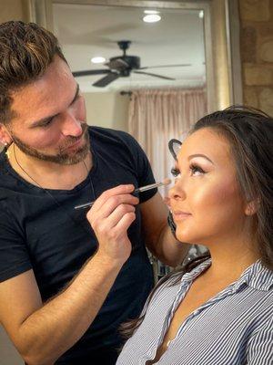 XANDRO beautifying a bride.