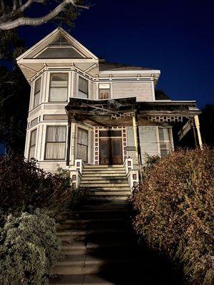 Michael Jackson's Thriller House looks pretty creepy at night especially at this angle with the trees in Angelino Heights LA  on Carroll Ave