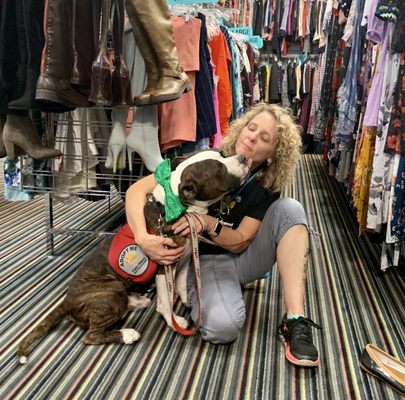 Taking a shelter dog out for the day thrift shopping. Getting a thank you kiss.