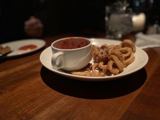 Calamari - pleasant but not crispy with marinara like dipping sauce