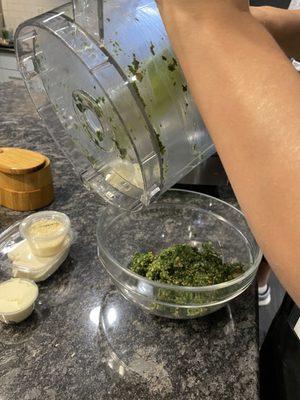 Making the pesto.