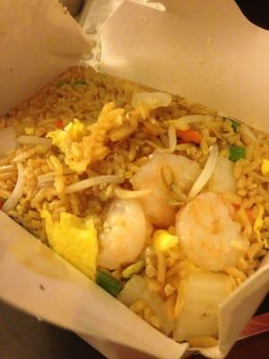 This rice has no yellow food color.  I see eggs, bean sprouts, veggies, and shrimp! For real!