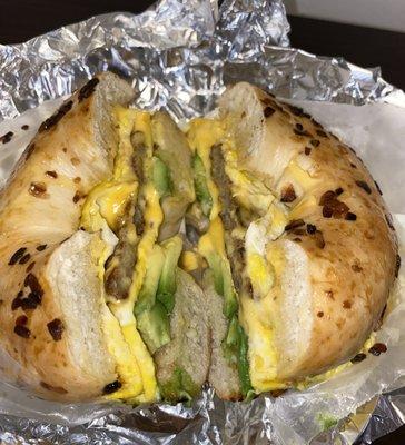 Turkey sausage, egg, cheese & avocado on an onion bagel