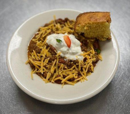 House made Chili 
Our house chili is made with our farm fresh beef, made in house. Served with cheese and a dollop of sour cream.