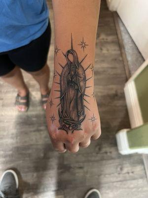 Virgin Mary tattoo