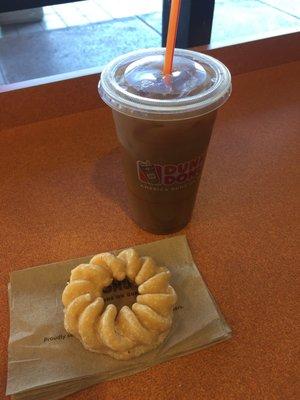 Iced Coffee with some milk and French Cruller