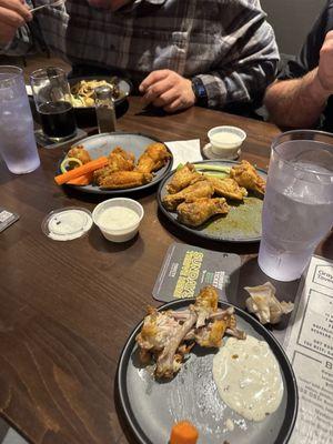 Cajun wings left and lemon pepper on the right. Crispy and delicious wings!