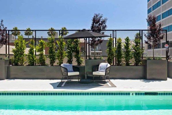 Featured is the pool area of the Arista Glen luxury apartments in Glendale, CA. Services included landscape and installation of pottery.