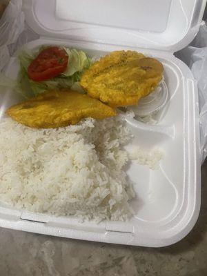 White rice, fried green plantain and salad