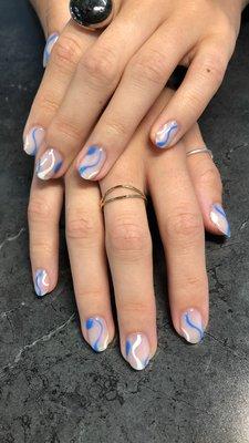 Gel polish, blue and white swirls, or any color you desire by Taryn.