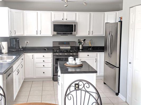 Finished kitchen after sprayed cabinets in lacquer