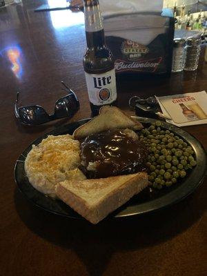 Daily special hamburger steak $8.95 includes a drink..