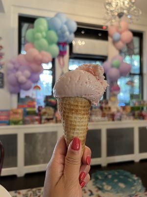 rose ice cream on sugar cone