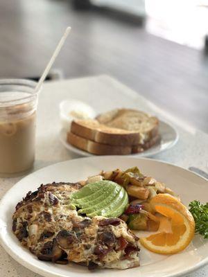 Egg white omelette (smoked bacon, mushrooms, onions, avocado), sourdough toast, oatmilk vanilla iced latte