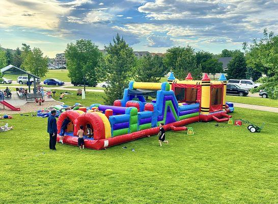 bounce house, obstacle course and water slide