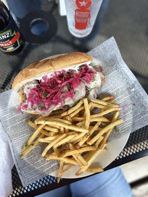 Saturday special, corned beef Philly cheese. With provolone cheese, pickled cabbage and a horseradish sauce.