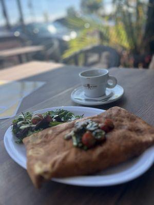 Savory Crepe Cherry tomato mozzarella and basil pesto I added roasted peppers to my order