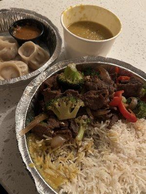 Pork momo (top left). Broccoli beef with dal