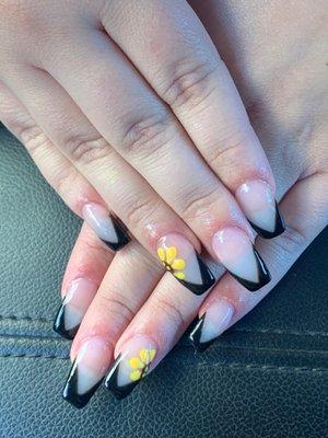 Black French  tip with a  yellow sunflower