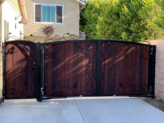 man gate + liftmaster operated driveway dual swing gate