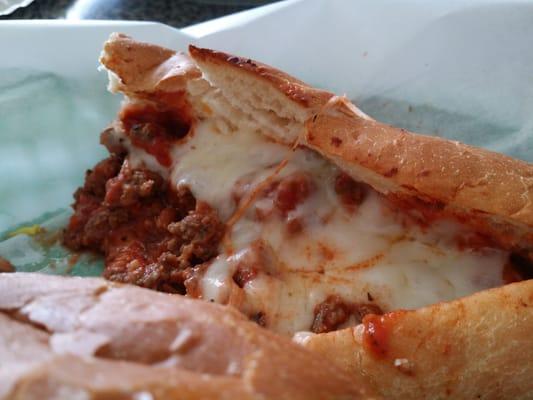 Meatball sub ... with little chopped up pieces of meat.... wouldn't equal a half meatball