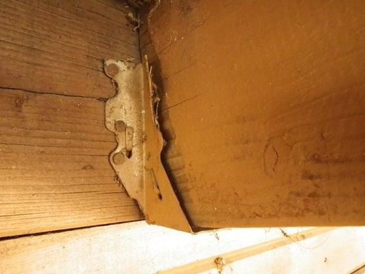 Not a screw or a nail used to secure this joist, one of many on this large deck.