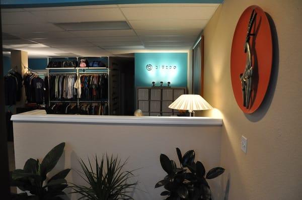 Entrance area with our Blezoo wall logo focal point, nice vegetation and some apparel ambiance.