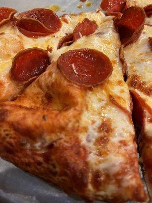 Pepperoni pizza slice