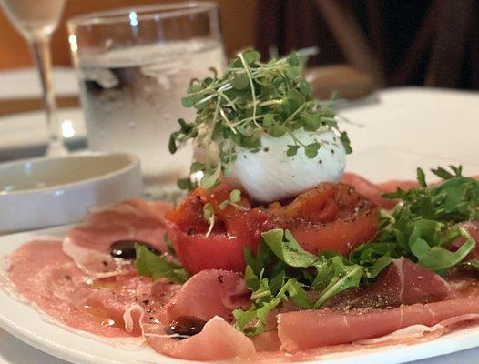 Prosciutto with burrata cheese and tomato