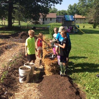 Our After School Program using their garden. Garden plots are available for rent