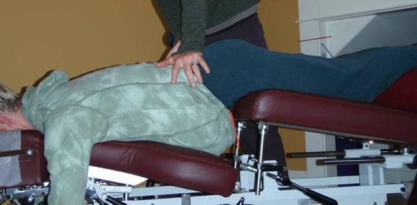 Pregnant women can lay comfortably face down during treatment.