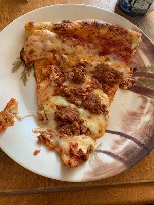 This is a reheated meatball slice. Cheese is good, solid slice