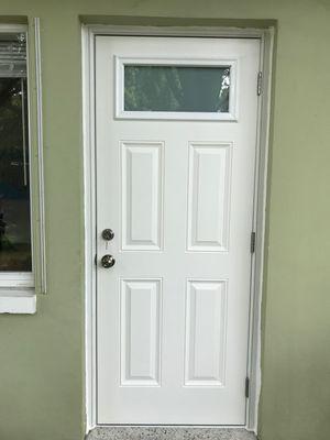 New Plastpro fiberglass entry door with impact rated glass top!