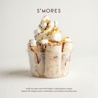 S'Mores Rolled Ice Cream: vanilla ice cream mixed with Nutella, crushed graham crackers, topped with whipped cream and marshmallows