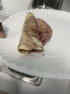 "Breakfast" they serve our kids here!! A taco tortilla with grape jelly! How is this nutritional?! This is horrible!