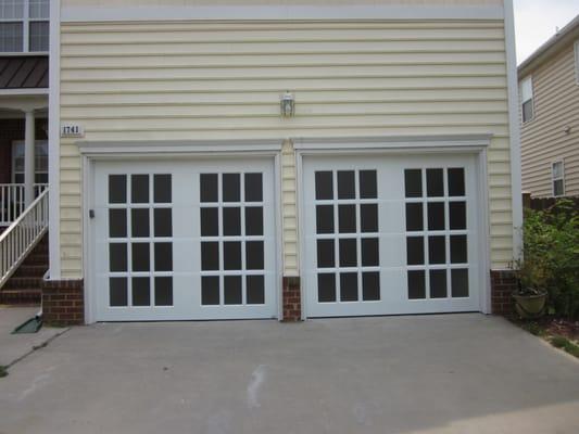 French Porte garage doors to look like French doors.