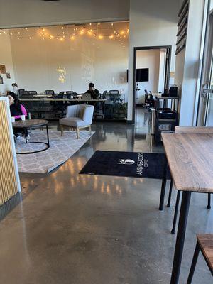 Workspace area with a few additional chairs and tables