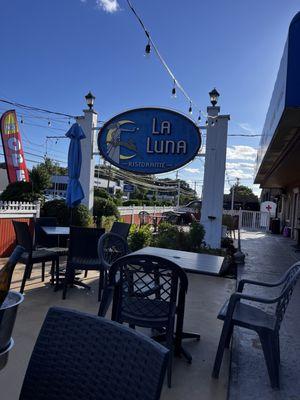 Sign overlooking the outdoor patio