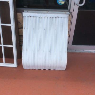 1 used clamshell awning 25" wide X 32" tall $55.00