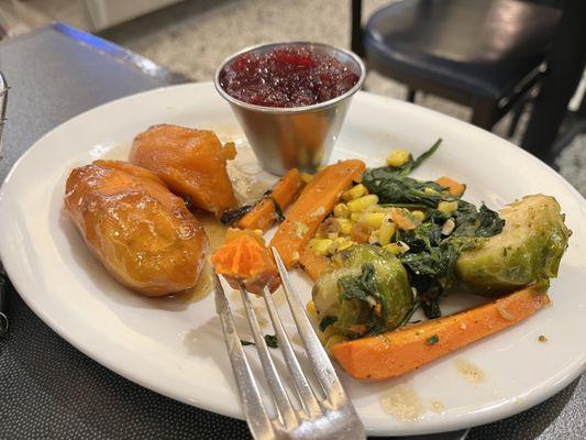 Thanksgiving dinner!!!! Soooooo goood! Candied yams, carrots, corn, brusselsprouts, and chunky cranberry sauce.