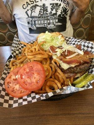 Bacon cheeseburger with curly fries