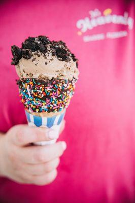 Caramel Sea Salt gelato topped with crushed Oreo in a chocolate dipped waffle cone-delish!