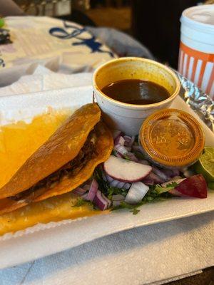 Birria taco with consomé